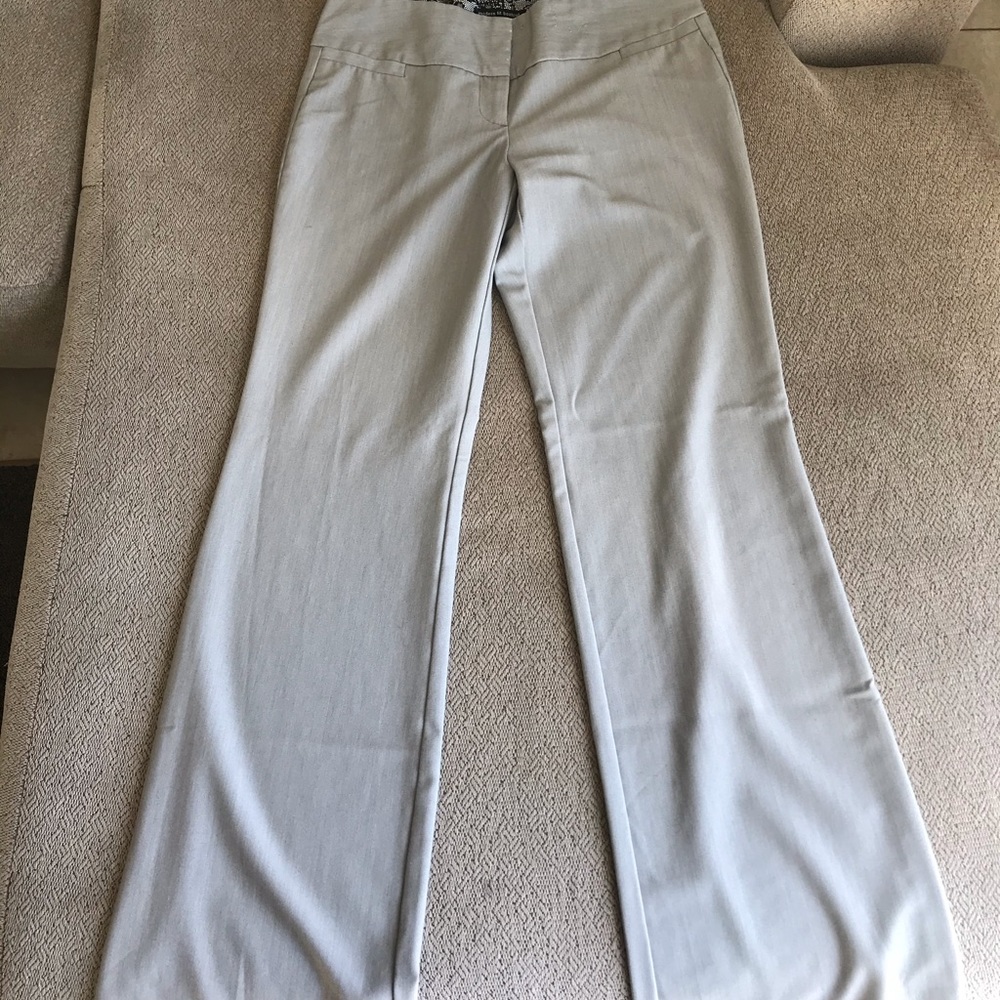 Light grey, dark grey and black pinstriped slacks